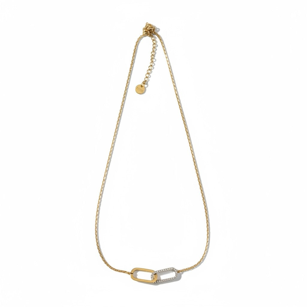 Linked Spark Necklace ατσάλινο κολιέ με δύο οβάλ κρίκους, ο ένας με ζιργκόν, σε χρυσό So Cute by Dimi