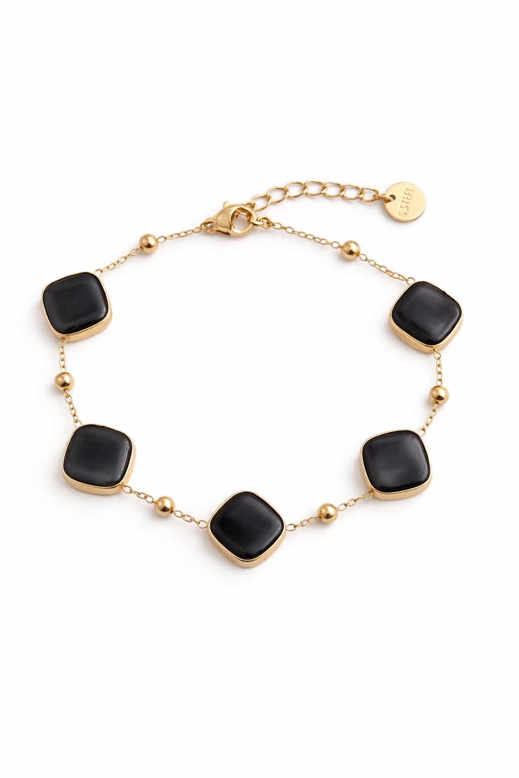 Gold steel bracelet with black square stones on a white background