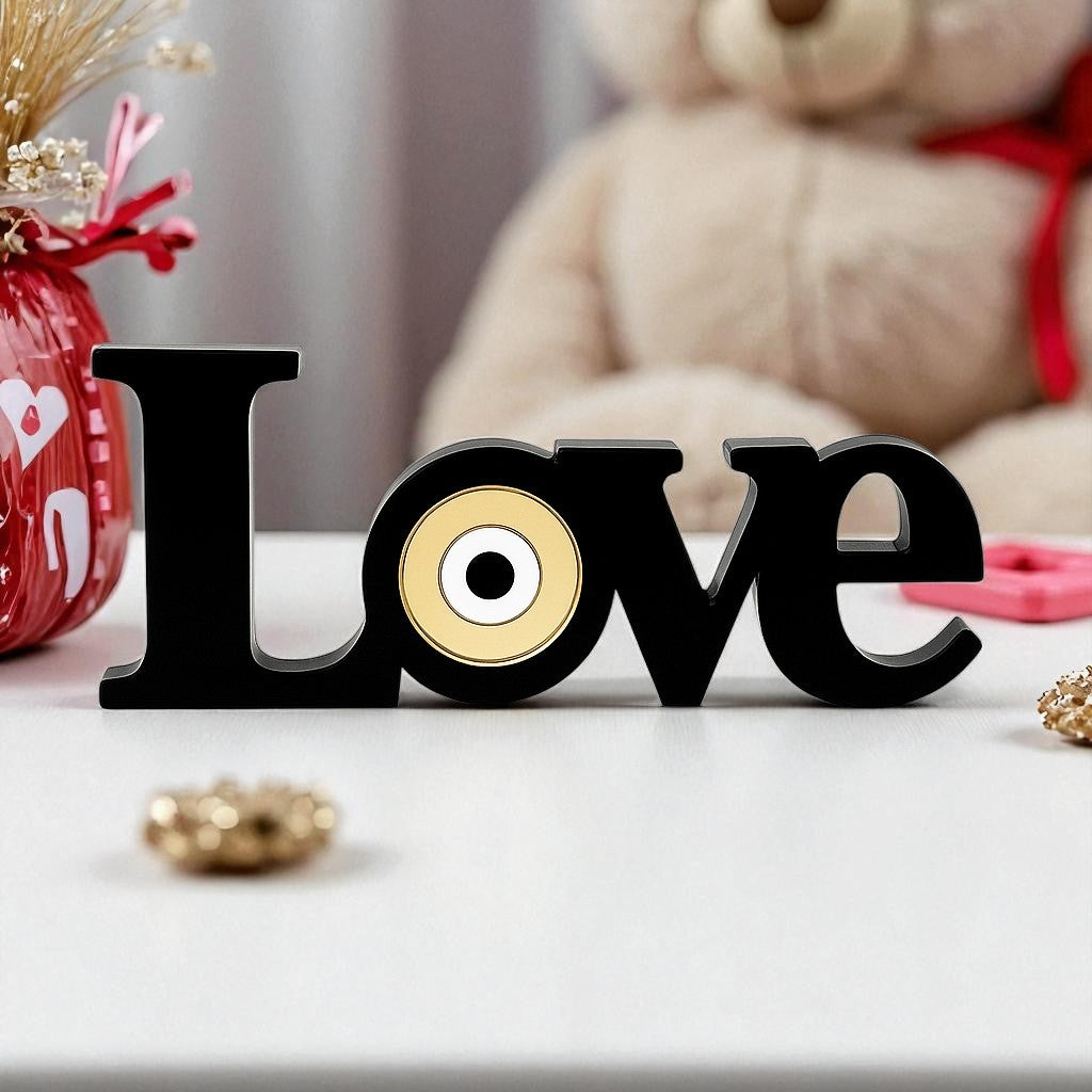 Επιτραπέζιο διακοσμητικό LOVE από plexiglass με χρυσό μάτι και μαύρη βάση