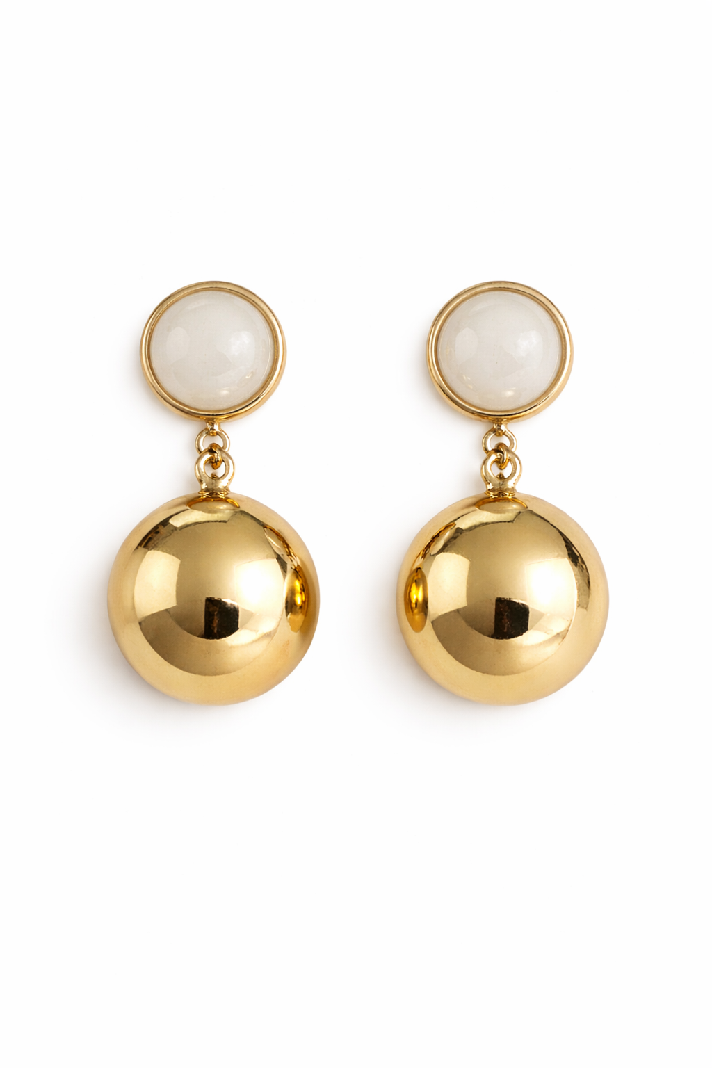 Pair of gold earrings with white stones on a white background