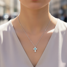 Lumi Eye Cross ατσάλινο κολιέ με σταυρό ζιργκόν και μπλε ματάκι So Cute by Dimi