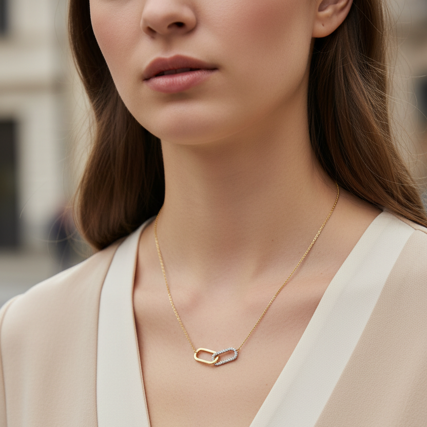 Linked Spark Necklace ατσάλινο κολιέ με δύο οβάλ κρίκους, ο ένας με ζιργκόν, σε χρυσό So Cute by Dimi
