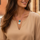 Χειροποίητο κολιέ Μάρτης Aegean Heart με lampwork καρδιά με μάτι και γυάλινο τυρκουάζ κύβο – So Cute by Dimi