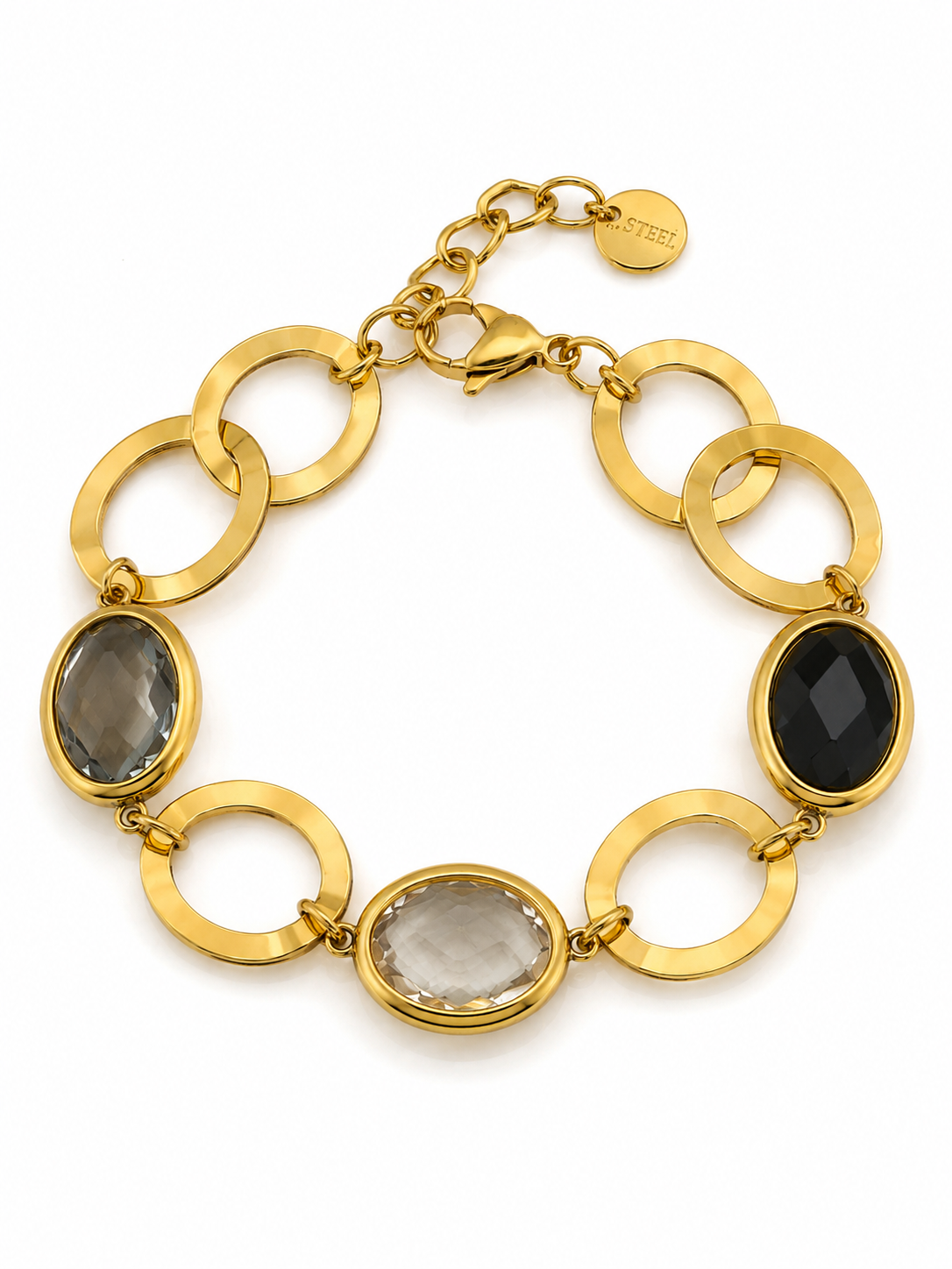 Elodie Bracelet χρυσό ατσάλινο βραχιόλι με οβάλ κρυστάλλινες πέτρες σε τριχρωμία μαύρο-διάφανο-φιμέ και μεγάλους κρίκους, σε λευκό φόντο