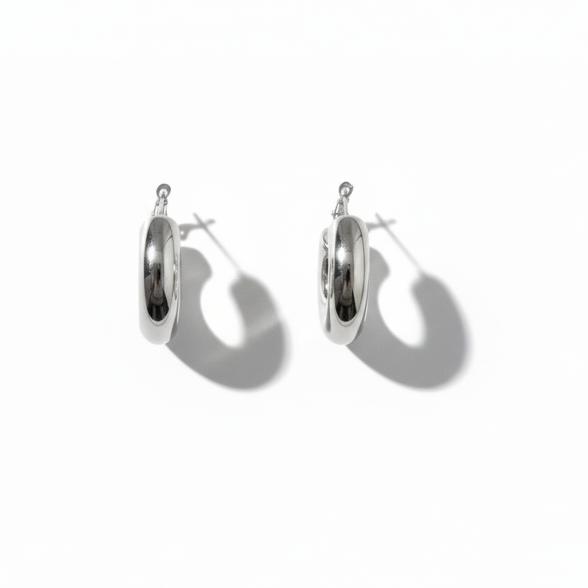 Bold Curve Hoops 30mm slim ατσάλινα σκουλαρίκια σε ασημί με καμπυλωτό design