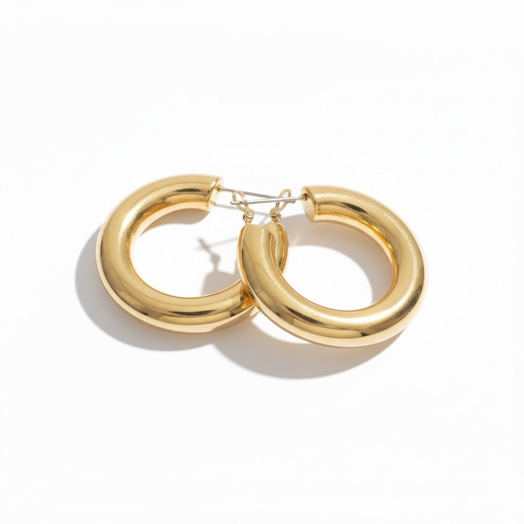 Bold Curve Hoops 40mm slim ατσάλινα σκουλαρίκια σε χρυσό με καμπυλωτό design
