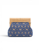 Blue lace clutch with wooden clasp on a white background