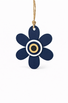 White plexiglass flower basket insert with layered evil eye detail for corporate Easter gifting