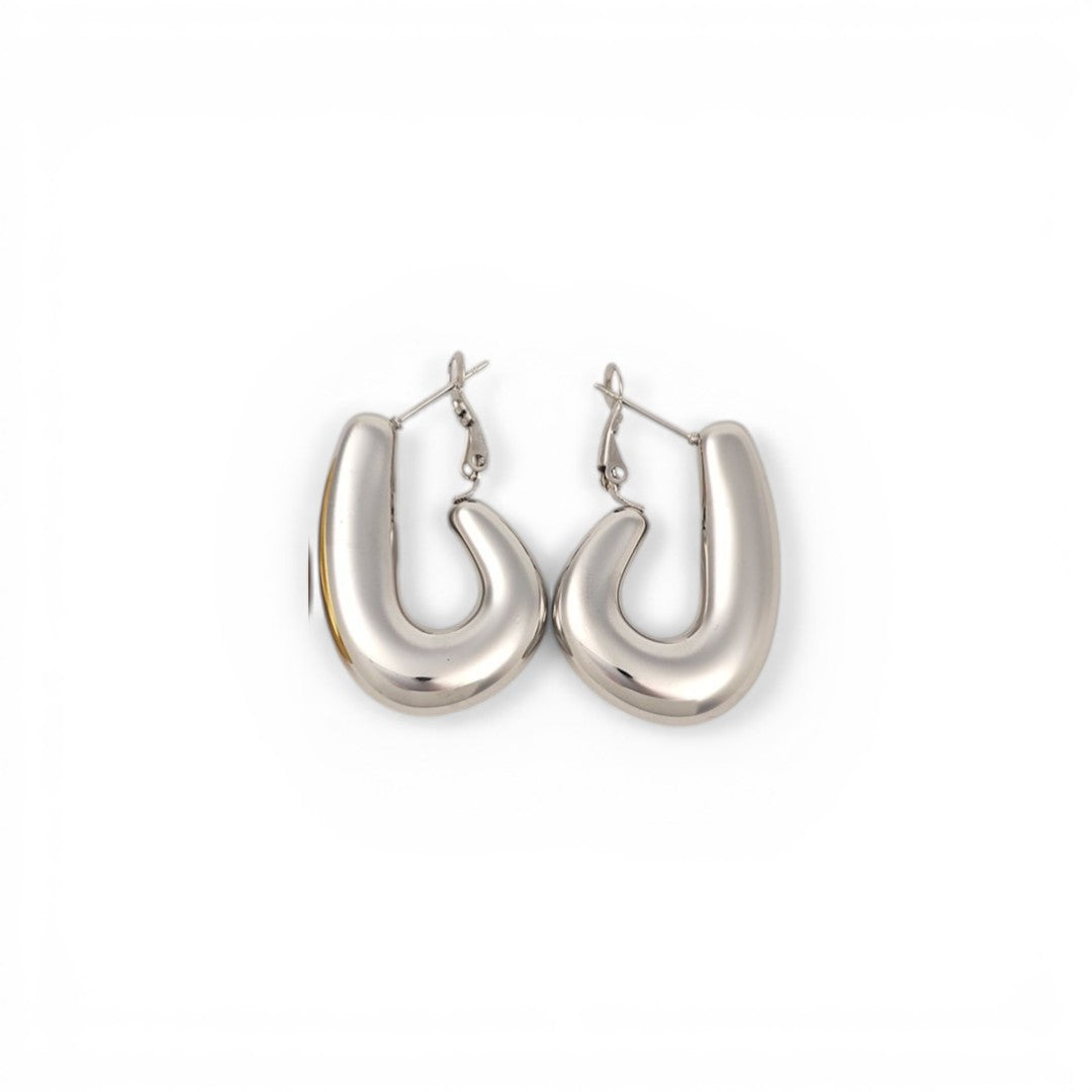 Silver hoop earrings on a white background