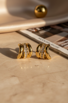 Σκουλαρίκια κρίκοι stainless steel σε χρυσό  με διακοσμητικές πέτρες So Cute by Dimi