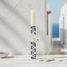 Handmade modern Easter candle with acrylic origami boat and eye-pattern ribbon – 30 cm.
