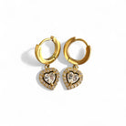Amor Earrings – Ατσάλινα σκουλαρίκια με κρικάκι και καρδιά με ζιργκόν σε χρυσό | So Cute by Dimi