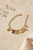 Χρυσό chunky βραχιόλι stainless steel με charms λουλούδι, καρδιά, μέλισσα και πασχαλίτσα
