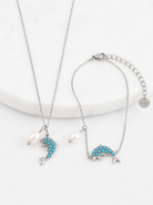 Azure Dolphin Bracelet ατσάλινο βραχιόλι σε χρυσό ή ασημί με δελφίνι από τιρκουάζ ζιργκόν και φυσική πέρλα – So Cute by Dimi