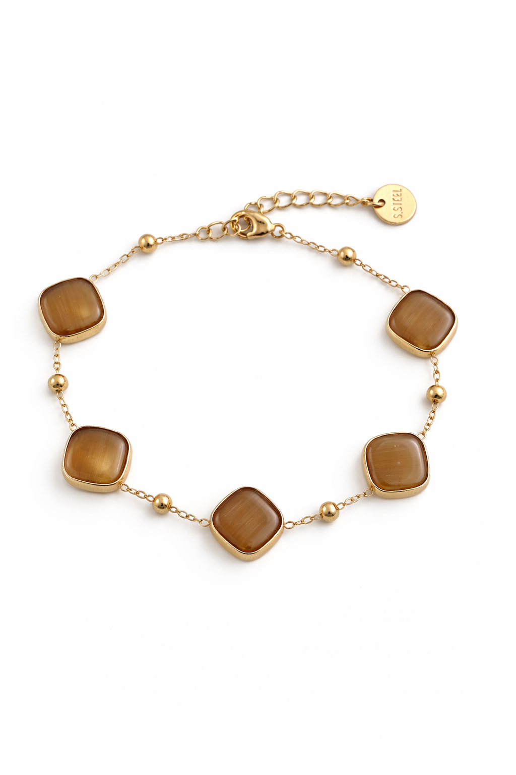 Gold steel bracelet with brown square stones on a white background