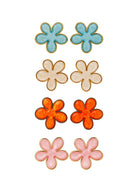 Set of colorful flower-shaped earrings on a white background