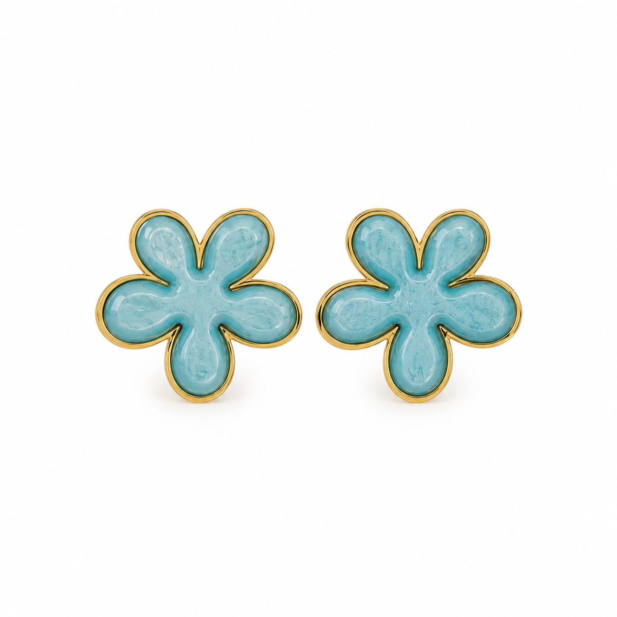 Pair of turquoise flower-shaped earrings with gold accents on a white background