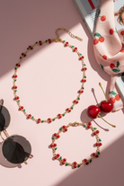 Κολιέ και βραχιόλι Cherry Bloom με κεράσια από ατσάλι χρυσό με κόκκινο και πράσινο σμάλτο So Cute by Dimi