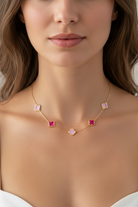 Necklace with pink gemstones worn by a model