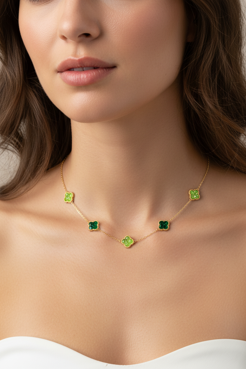 Necklace with green gemstones worn by a model