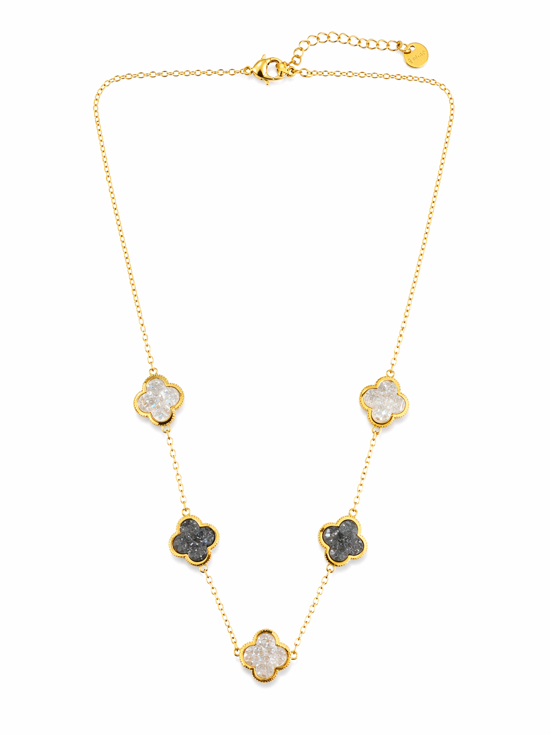 Gold necklace with clover-like stones on a white background