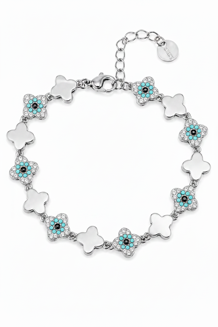 Ατσάλινο βραχιόλι με clover στοιχεία και zircon evil eye λεπτομέρειες σε ασημί φινίρισμα σε λευκό φόντο by So Cute by Dimi