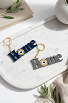 Χειροποίητο μπρελόκ HOME από plexiglass με μάτι σε χρυσό καθρέφτη – So Cute by Dimi