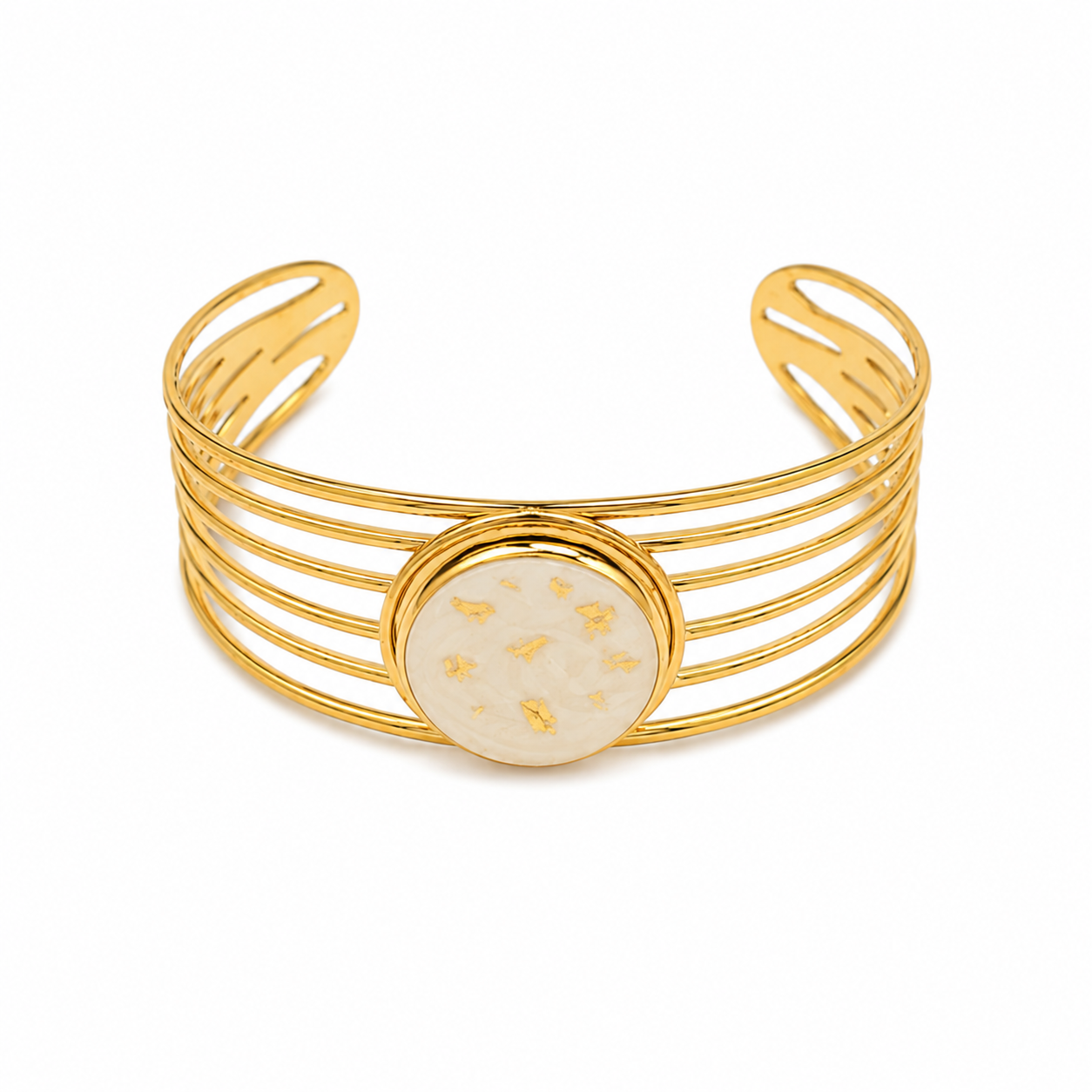 Gold bracelet with a central circular design on a white background