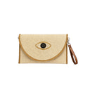Ψάθινο clutch bags με evil eye σχέδιο σε  εκρού χρώμα σε λευκό φόντο – So Cute by Dimi