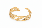 Gold stainless steel bracelet with fish designs on a white background, So Cute by Dimi