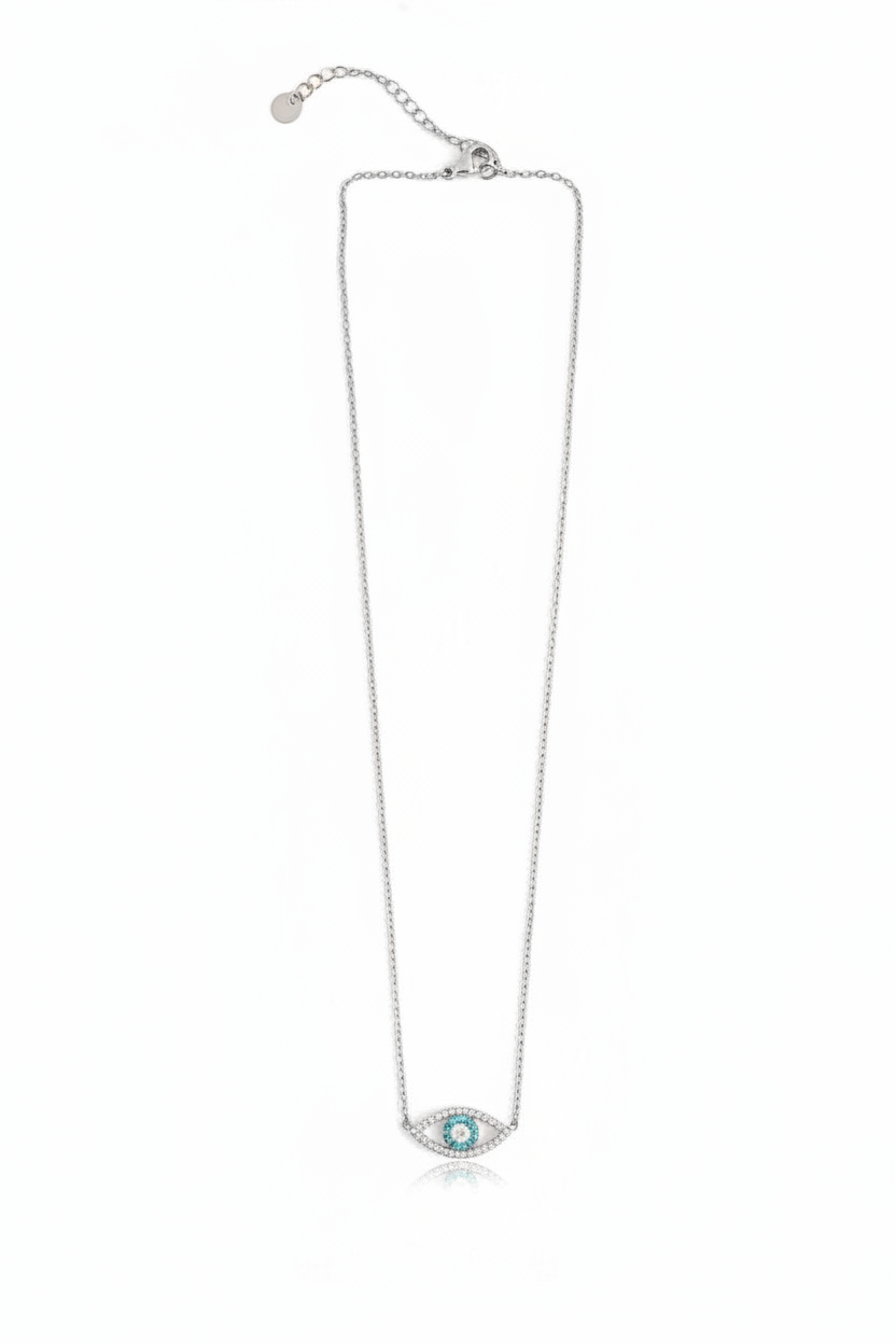 Silver necklace with a blue evil eye pendant on a white background