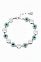 Ατσάλινο ασημί βραχιόλι με evil eye στοιχεία και zircon λεπτομέρειες σε λευκό φόντο by So Cute by Dimi