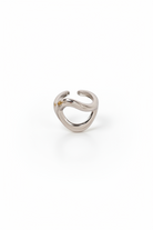 Staineless steel silver open ring on a white background, So Cute by DImi