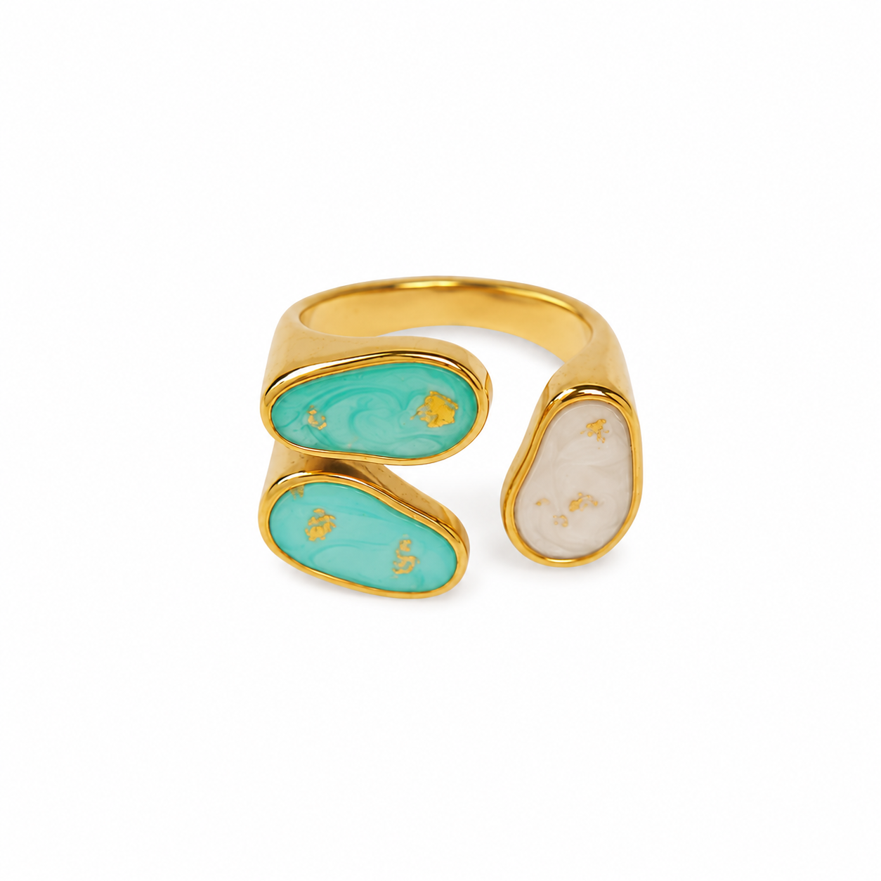 Gold ring with turquoise and beige stones on a white background