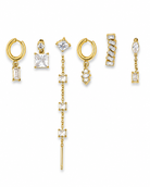 Set of gold and crystal earrings on a white background